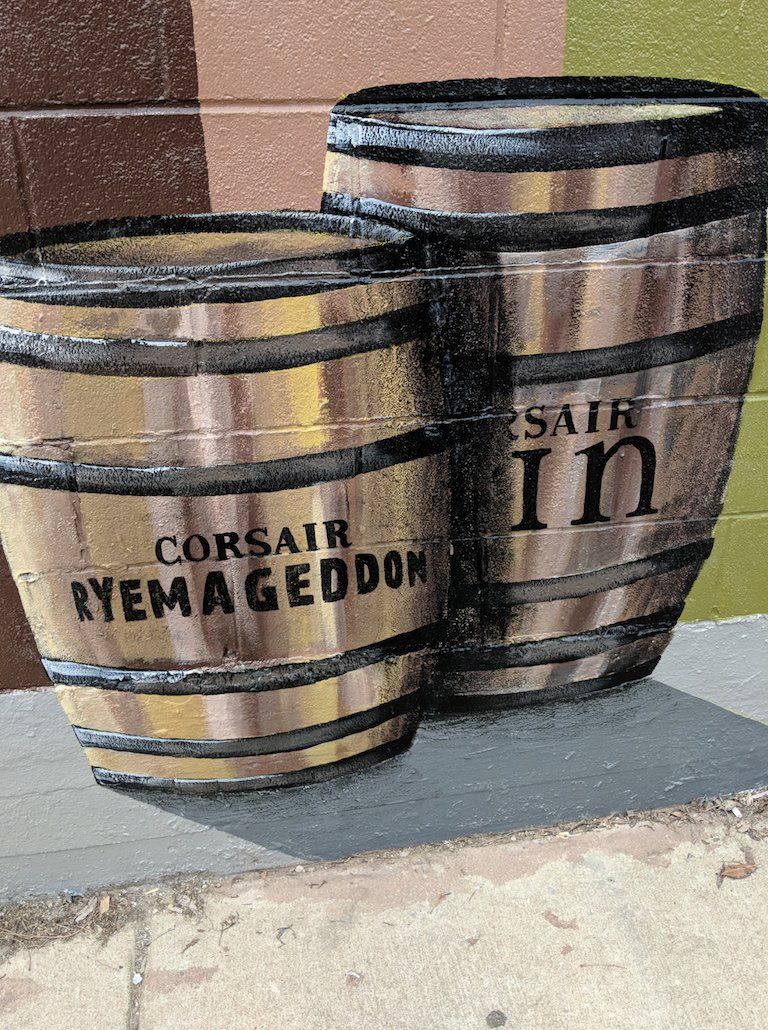 A painting of two barrels that say corsair ryemageddon