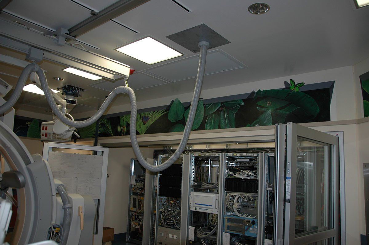 A room with a hose hanging from the ceiling
