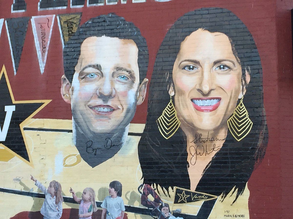 A painting of a man and a woman on a wall