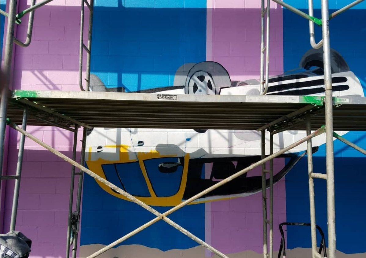 A scaffolding with a picture of a car on it