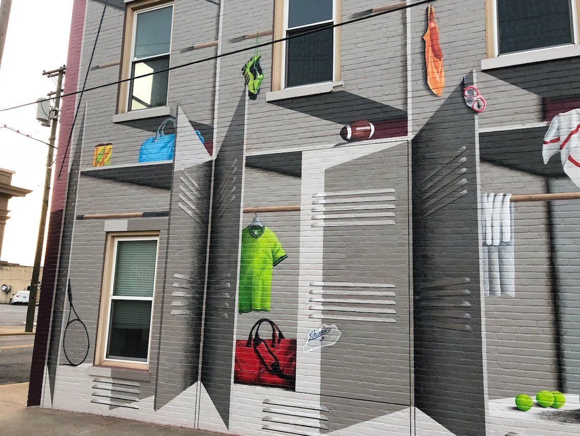 A building with a mural on the side of it