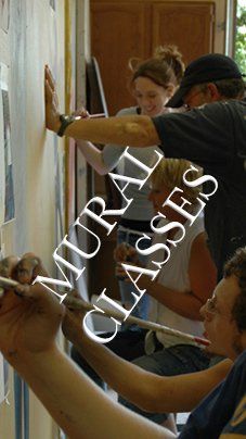 A group of people are painting on a wall with the words mural classes above them