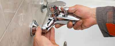 Toilet Repair- Plumber Holding Bathroom Sink in Watsonville, CA Toilet Repair - Plumber Holding Bathroom Sink in Watsonville, CA