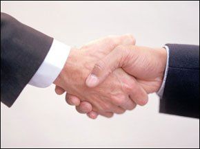 Legal services - Ammanford, Carmarthenshire - Philip Avery & Co - Shaking hands Shaking hands