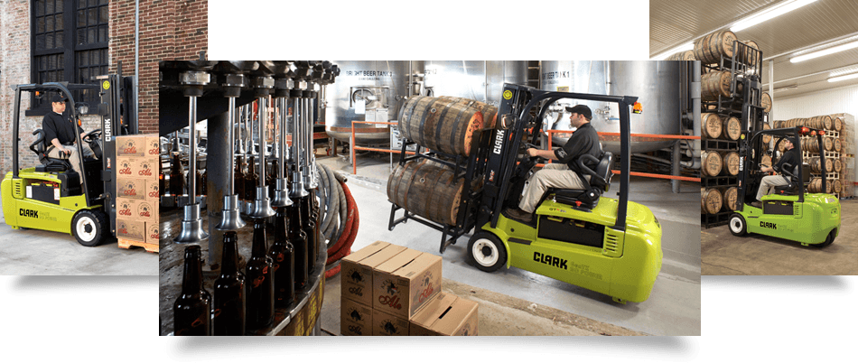 A Clark forklift carrying agricultural feeds efficiently