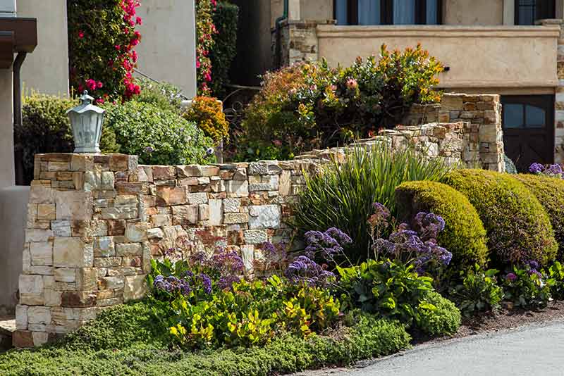 Intricate Stone Wall — Landscaping and Excavation Services in Cameron Park, NSW