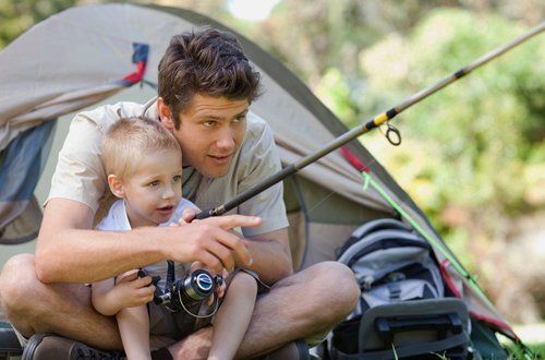 A man and child fishing