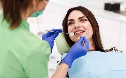 Beautiful Woman Having Tooth Examination | Granger, IN | Bittersweet Road Family Dentists Beautiful Woman Having Tooth Examination | Granger, IN | Bittersweet Road Family Dentists