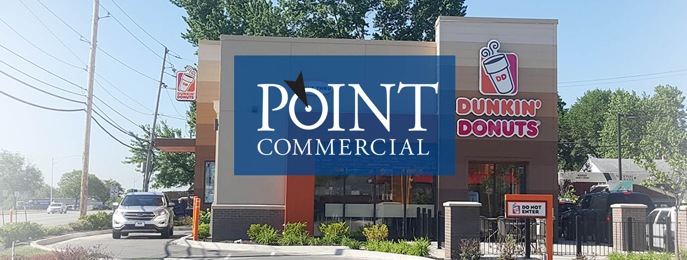 A dunkin donuts restaurant is being advertised by point commercial
