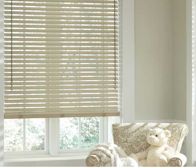 Window Blind Cleaning — Wood Blinds Protecting The Teddy Bear On The Chair In Belgrade, MT