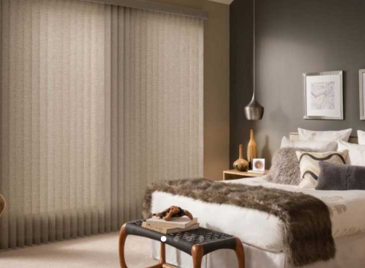Residential Draperies — Bedroom With Vertical Blinds In Belgrade, MT