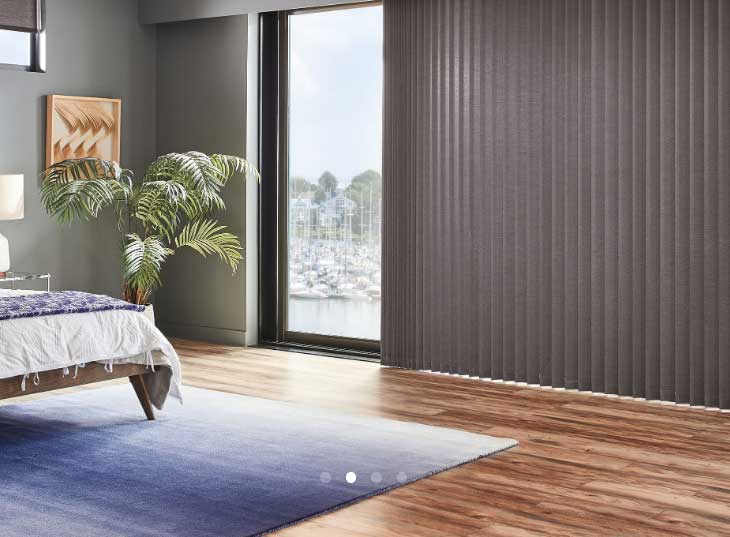 Window Blind Cleaning Expert — Gray Blinds With Plants In A Pot Inside The Room In Belgrade, MT