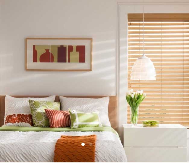 Curtains — Bedroom With Faux Blinds On Windows In Belgrade, MT