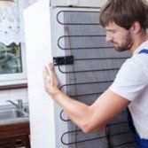 Handyman trying to move a fridge in Yorktown, VA