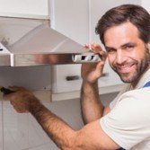 Handyman fixing the oven in Yorktown, VA