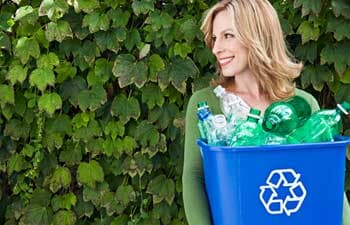 Woman Holding a Trash bin — Rubbish Removal in Yardly, PA