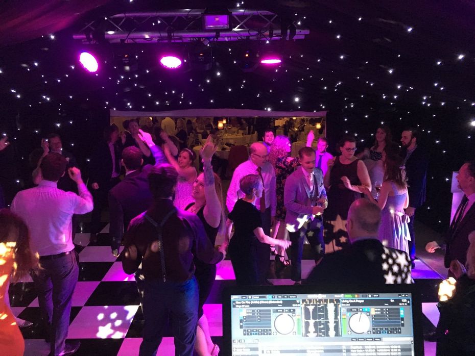 wedding dancing bride and crowd dancing on dance-floor at wedding party