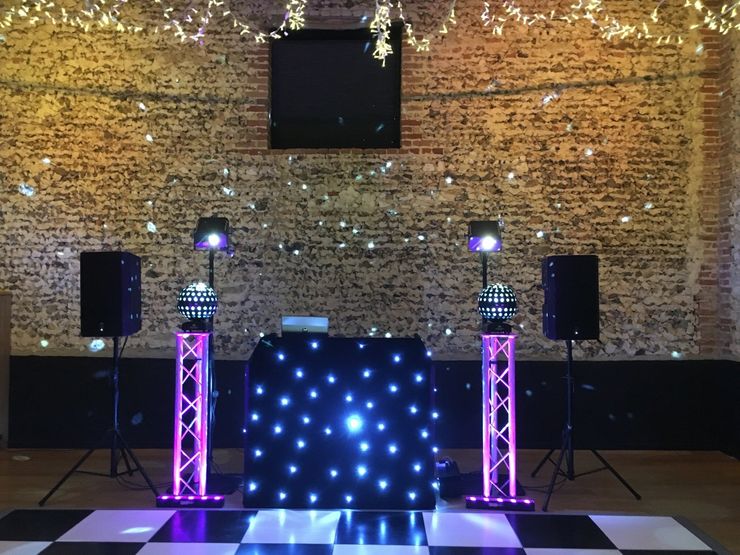simple disco seen in room lighting simple light show seen in normal room light before start of disco