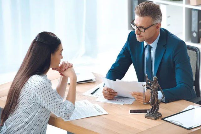 Lawyer and Client Talking — Belchertown, MA — Law Offices of Richard H Maynard PC Lawyer and Client Talking — Belchertown, MA — Law Offices of Richard H Maynard PC