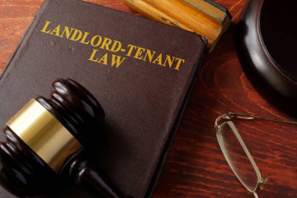 Landlord-Tenant Law Book and Gavel — Belchertown, MA — Law Offices of Richard H Maynard PC Landlord-Tenant Law Book and Gavel — Belchertown, MA — Law Offices of Richard H Maynard PC