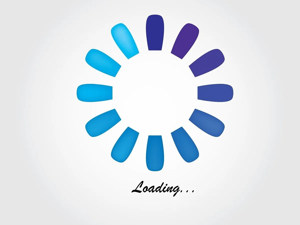 Loading circle of blue gradient shapes.