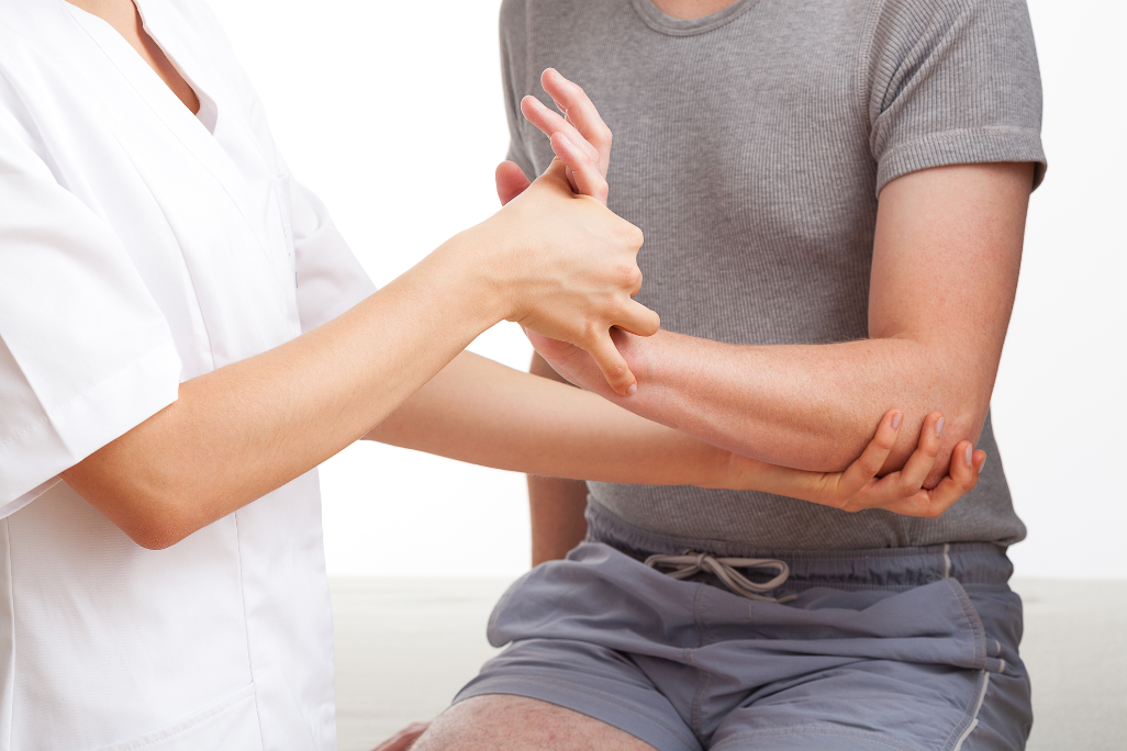 PT manipulating wrist