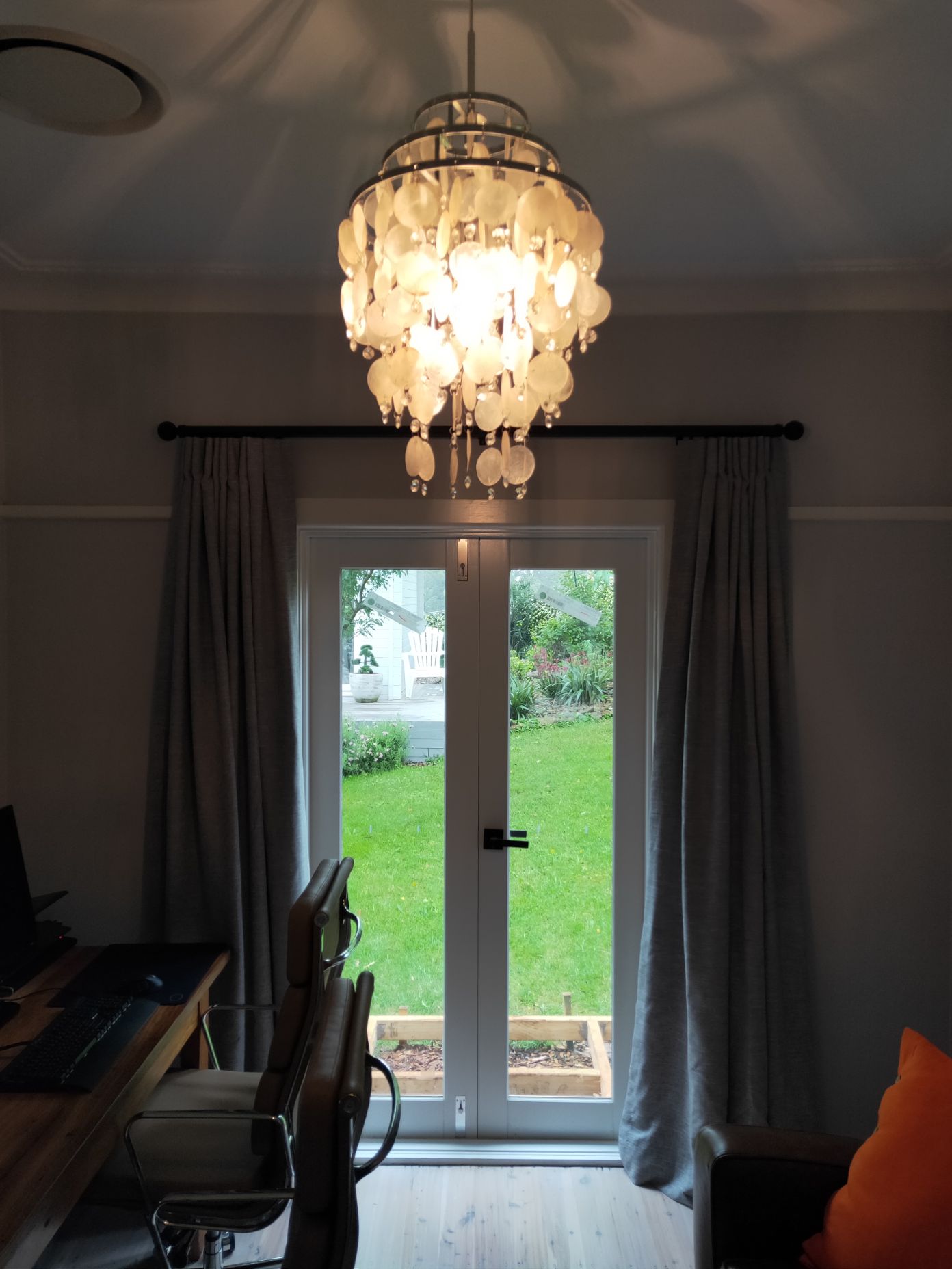 Lighted Chandeliers And Open Window Curtains - Curtains in Welby, NSW