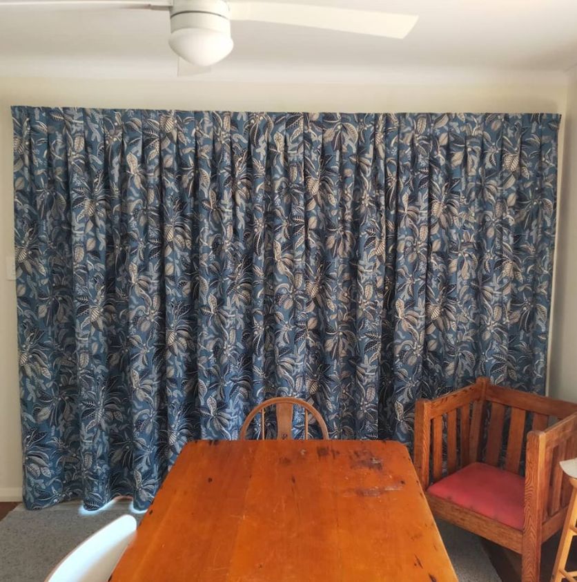 Blue curtains, table and chair - Curtains in Welby, NSW