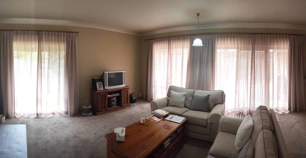 Living area with curtains - Curtains in Welby, NSW