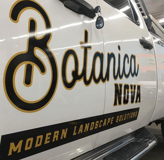 White service truck with gold-and-black