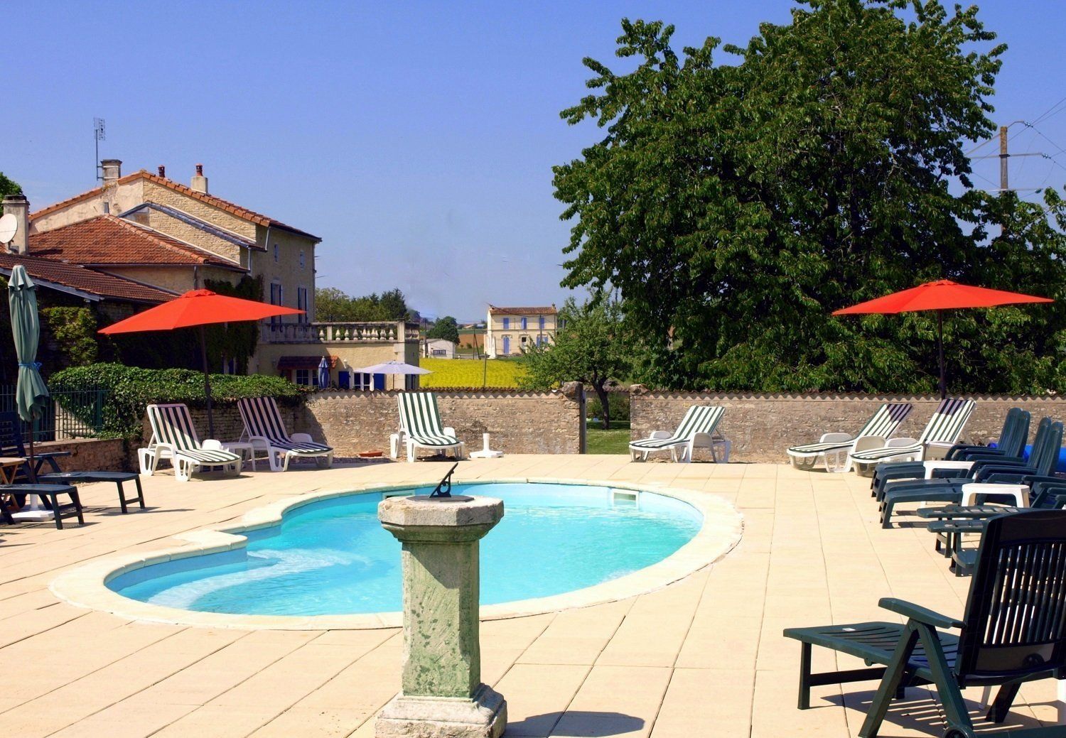 Heated Pool with plenty of sun loungers