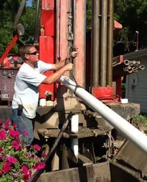 Well Drilling - Water Well Drilling in Valparaiso, A professional doing water well drilling installation in Crown Point, IN