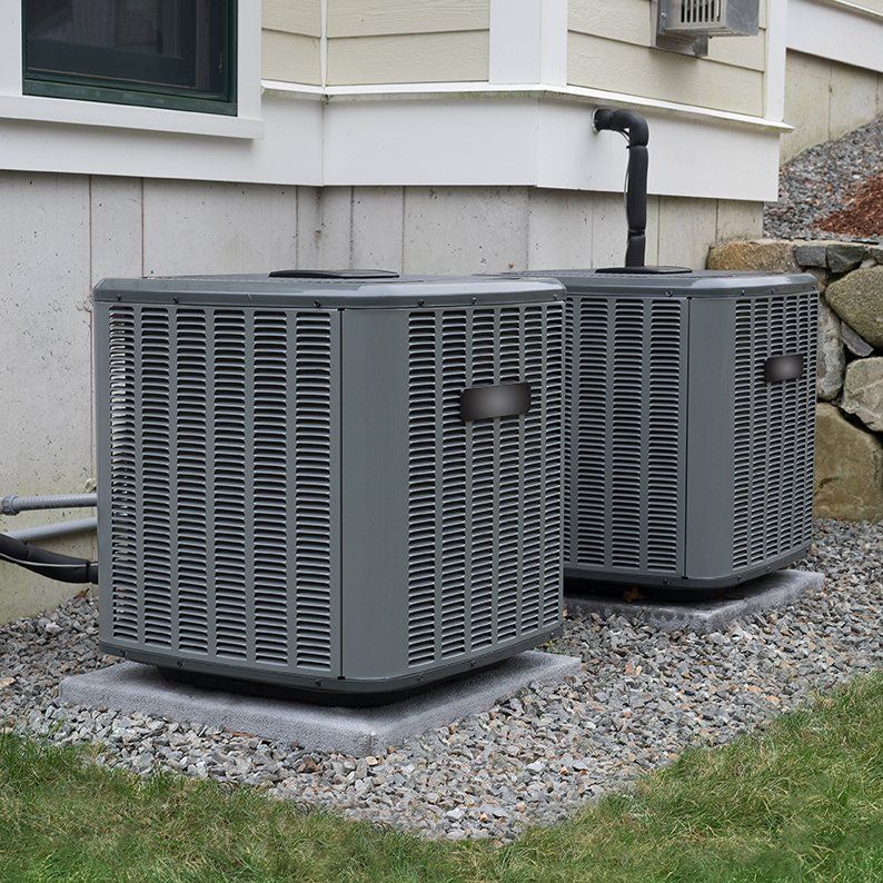 AC Units in backyard of a residential house in Conway, AR.