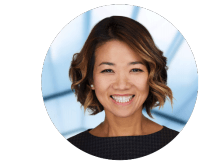 A woman with short hair is smiling in a circle.
