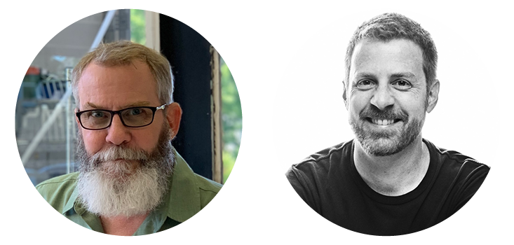 A man with a beard is wearing glasses and a black shirt.