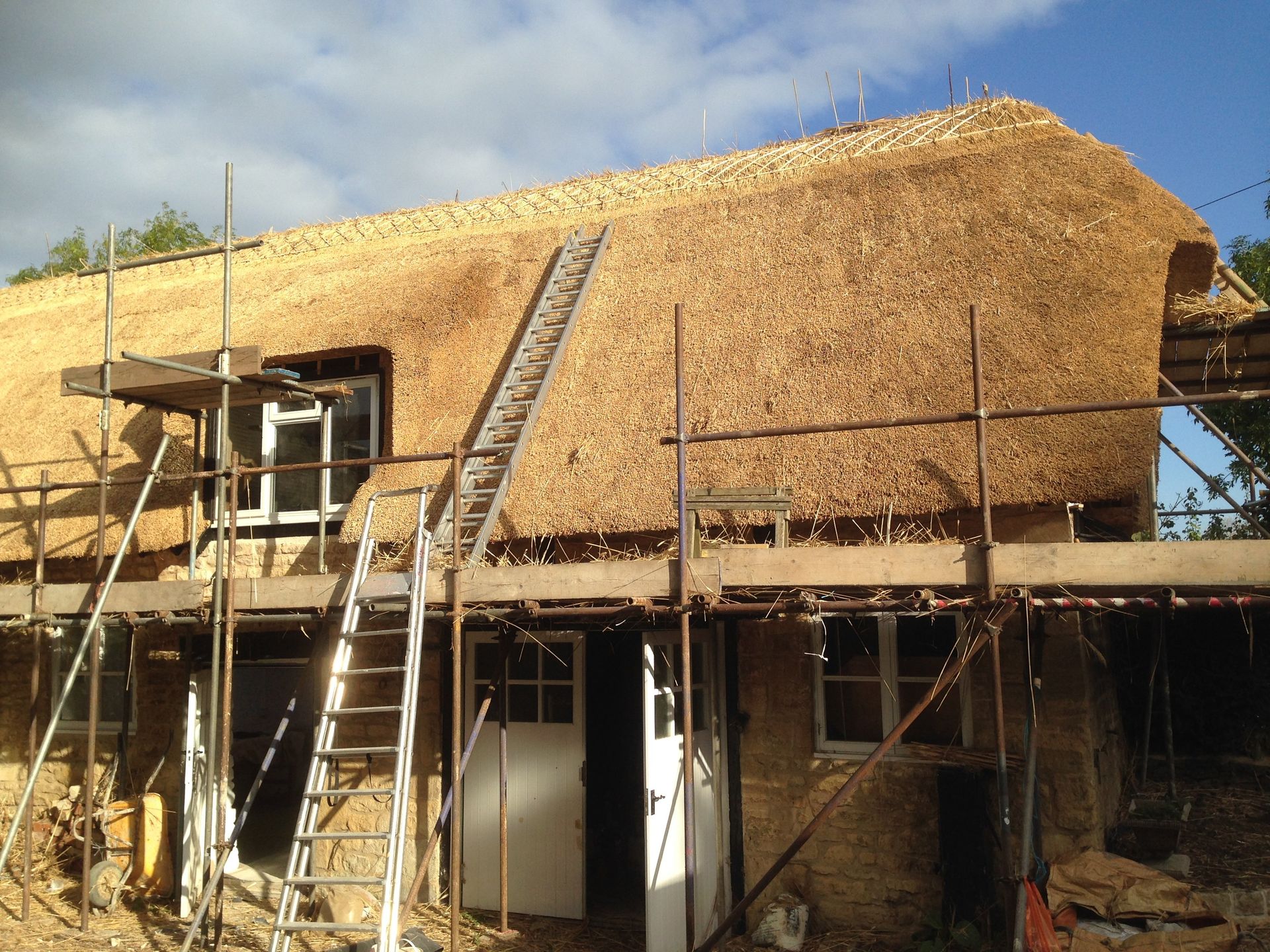 thatched roof restoration by RTB construction in Cheltenham