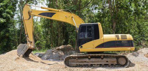 An excavating contractor moving sand in Anchorage, AK
