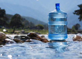 water jug in a stream