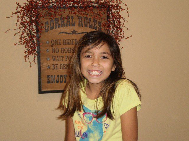Girl Smiling in the Camera — Specialist in Vernia, TX