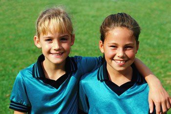 Kids Smiling in the Camera — Dental Care Services in Vernia, TX