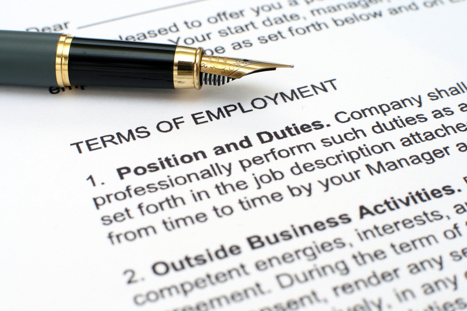 Personal Injury Attorney — Close Up Of Employment Contract And Pen in Providence, RI Personal Injury Attorney — Close Up Of Employment Contract And Pen in Providence, RI
