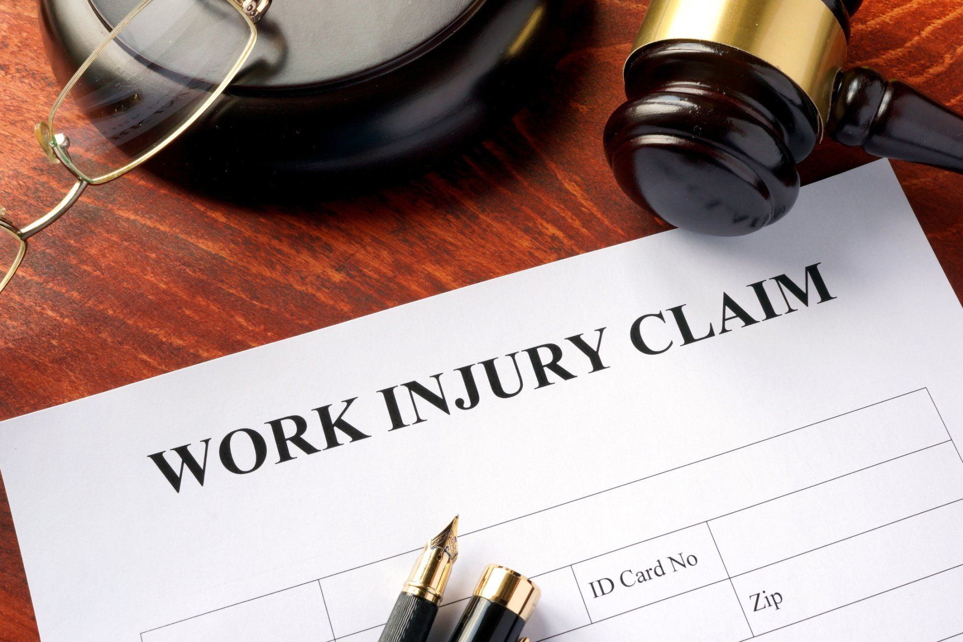 Workers Compensation — Work Injury Claim Form On A Table in Providence, RI Workers Compensation — Work Injury Claim Form On A Table in Providence, RI