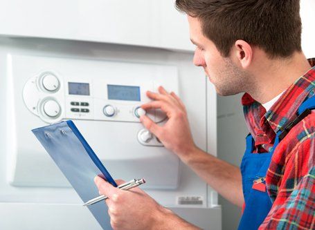 Gas heating specialist checking the heating system in Rotorua