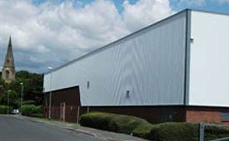 Durable wall cladding coatings