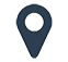 Un pin de mapa azul con un círculo en el medio sobre un fondo blanco.