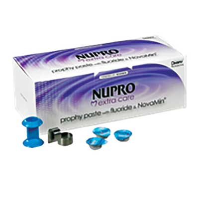 Box of NUPRO Extra Care prophy paste with blue cups, cap, and metal clasp.