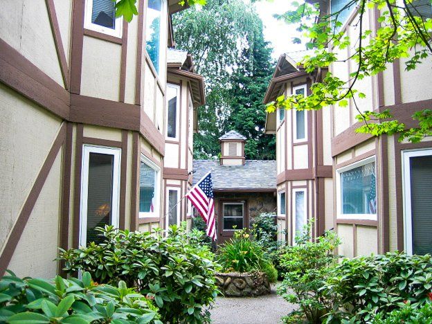 A house with an american flag in front of it