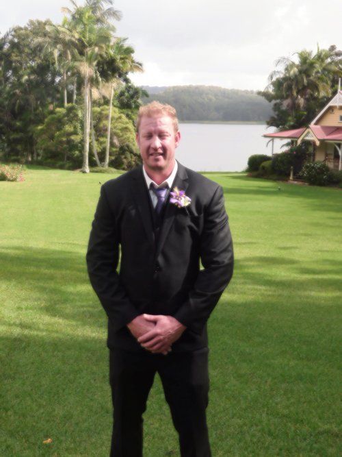 man in black suit