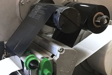A close up of a printing machine