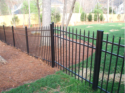 Aluminum Fence in Grass — Greenville, SC — Pioneer Fence in Greenville